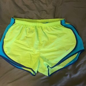 Neon green and blue Nike shorts